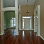 Dining Room with Columns, Chair Railing, & Picture Molding