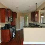 Gourmet Kitchen with Granite Countertops, Stainless Steel Appliances, & Pantry