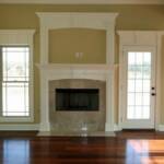 Gas Fireplace with overhead media center framed in stately molding