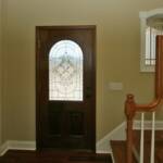 Foyer with leaded glass entry door