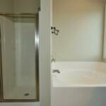 Separate Shower and Garden Tub in Master Bath, Ceramic Tile Floors with Decorative inlay