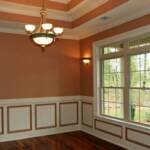 Formal Dining Room with double tray ceiling, chair railing & picture molding